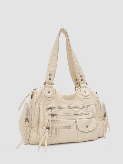 [strip: 6-Month Bellamire-Warranty | Good to know: This product is covered by the 6-month Bellamire-Warranty. In case of material or manufacturing defects, we will repair or replace the bag.]