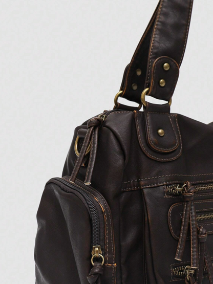 [strip: 100% veganes Leder | Das vegane Leder fühlt sich angenehm weich an und ist gleichzeitig wasserabweisend, kratzfest und besonders robust. So behält die Tasche auch bei täglicher Nutzung ihre elegante Optik.]