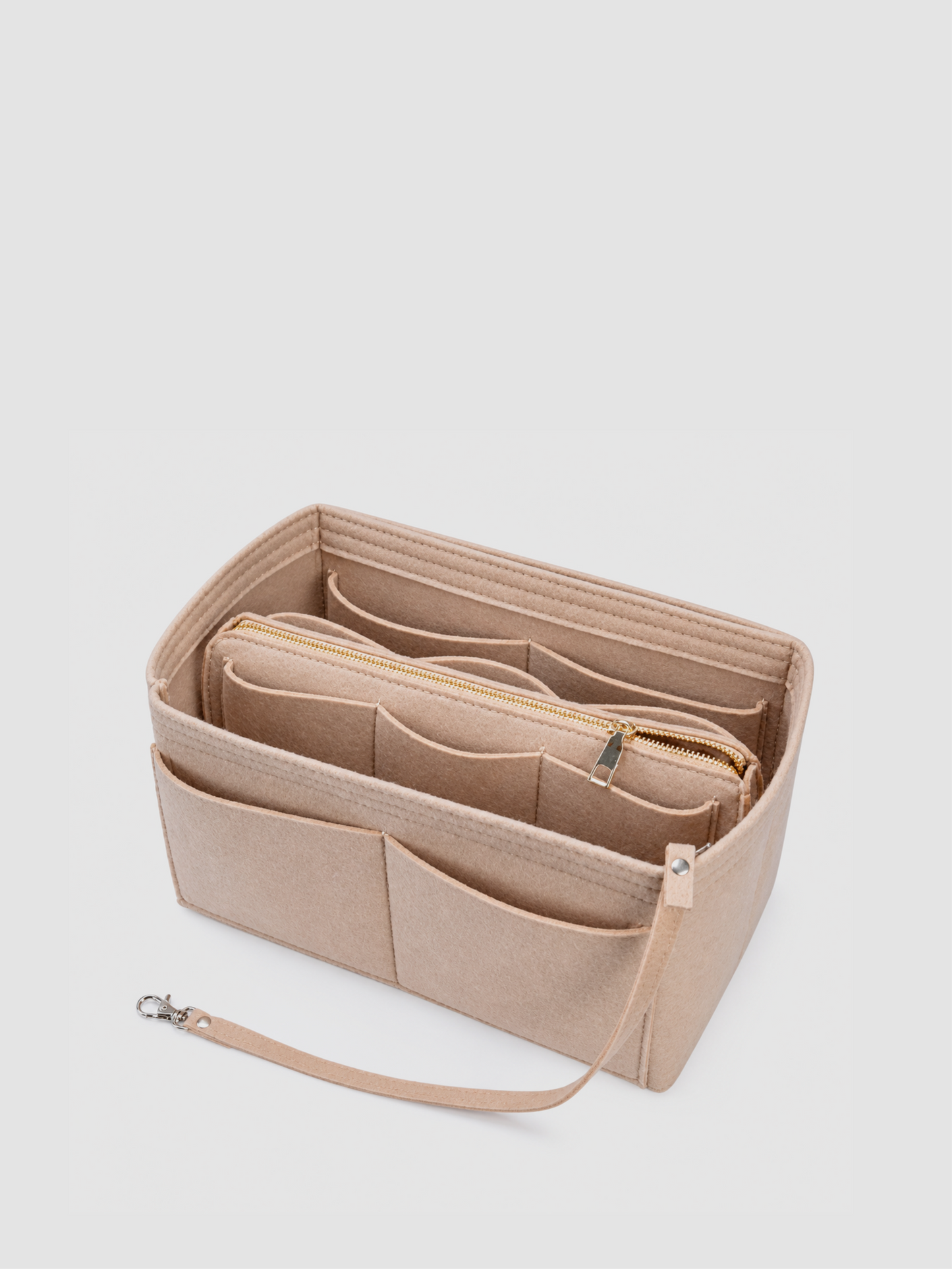[strip: Smart pockets | Multiple pockets in different sizes keep your lipstick, keys, headphones, and cards in their dedicated spots — everything within instant reach, no more digging around.]