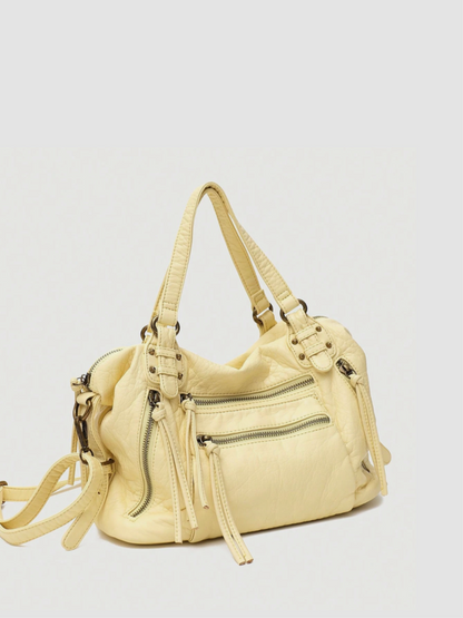 [strip: Adjustable Extra Strap | For even more comfort, there is an additional, adjustable extra strap that you can customize to your needs, allowing you to comfortably carry the bag over your shoulder or as a crossbody.]