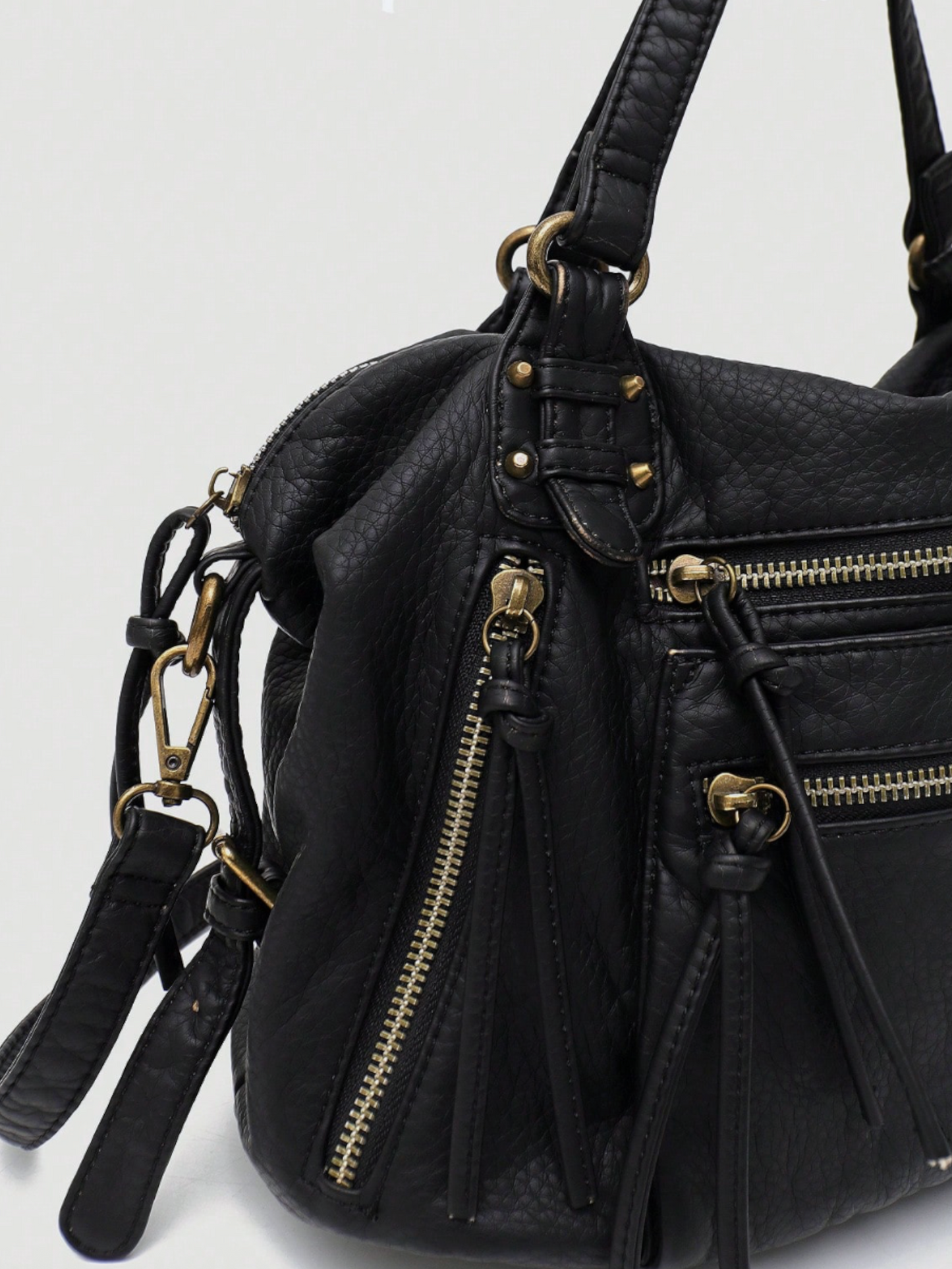 [strip: 100% Vegan Leather | The vegan leather feels pleasantly soft while being water-resistant, scratch-proof, and exceptionally durable. This way, the bag retains its elegant look even with daily use.]