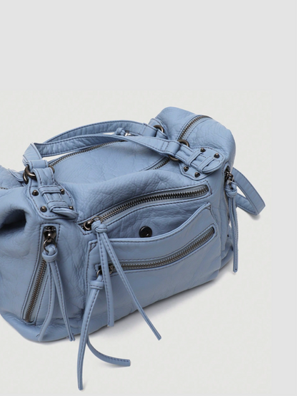 [strip: Adjustable Extra Strap | For even more comfort, there is an additional, adjustable extra strap that you can customize to your needs, allowing you to comfortably carry the bag over your shoulder or as a crossbody.]
