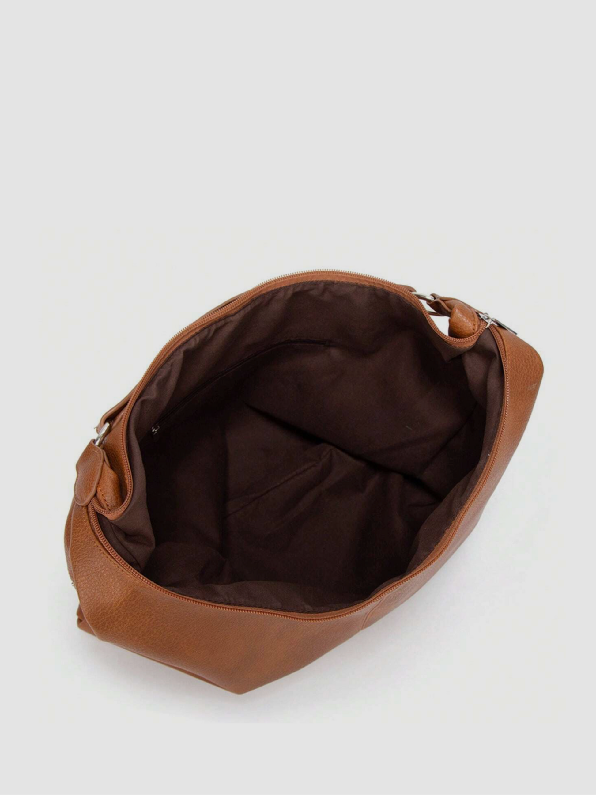 [strip: Practical Inner Pockets | Organization made easy: A zippered inner pocket keeps valuables like keys or cards safe. An additional inner compartment keeps your phone and essentials within reach, without any rummaging.]