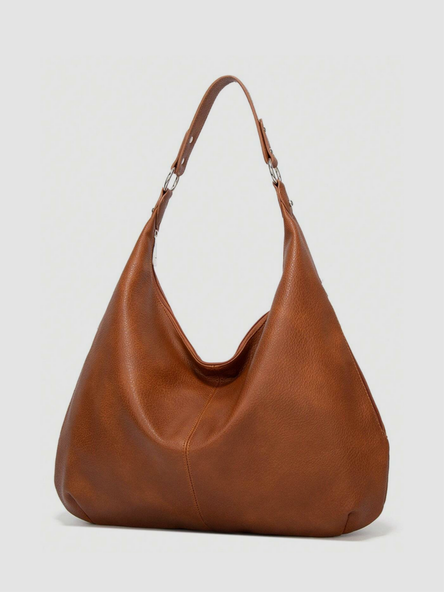 [strip: Wide Shoulder Straps | The straps are just the right length so you can comfortably carry the bag over your shoulder. Especially comfortable thanks to their wide cut, so nothing digs in or hangs awkwardly, even on longer days.]