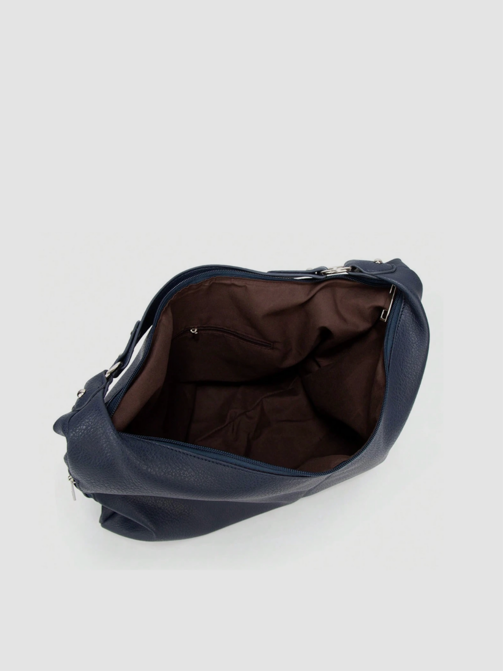 [strip: Practical Inner Pockets | Organization made easy: A zippered inner pocket keeps valuables like keys or cards safe. An additional inner compartment keeps your phone and essentials within reach, without any rummaging.]