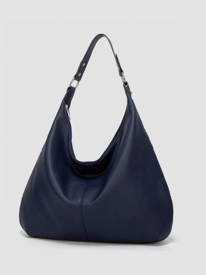 [strip: Wide Shoulder Straps | The straps are just the right length so you can comfortably carry the bag over your shoulder. Especially comfortable thanks to their wide cut, so nothing digs in or hangs awkwardly, even on longer days.]