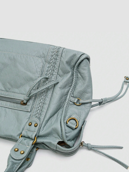 [strip: 100% veganes Leder | Das vegane Leder fühlt sich angenehm weich an und ist gleichzeitig wasserabweisend, kratzfest und besonders robust. So behält die Tasche auch bei täglicher Nutzung ihre elegante Optik.]