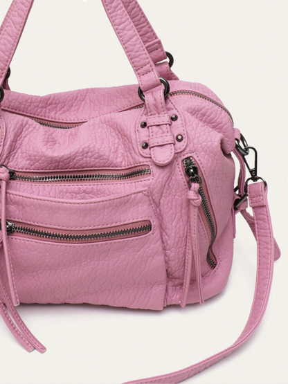 [strip: 100% Vegan Leather | The vegan leather feels pleasantly soft while being water-resistant, scratch-proof, and exceptionally durable. This way, the bag retains its elegant look even with daily use.]