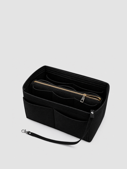 [strip: Smart pockets | Multiple pockets in different sizes keep your lipstick, keys, headphones, and cards in their dedicated spots — everything within instant reach, no more digging around.]