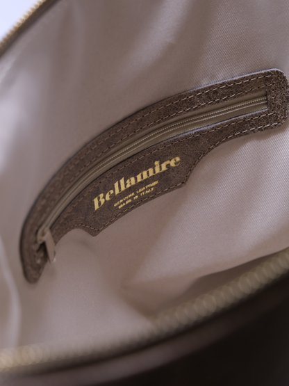 [strip: Practical Inner Pockets | Organization made easy: A zippered inner pocket keeps valuables like keys or cards safe. Two additional inner compartments keep your phone and essentials within reach, without any rummaging.]